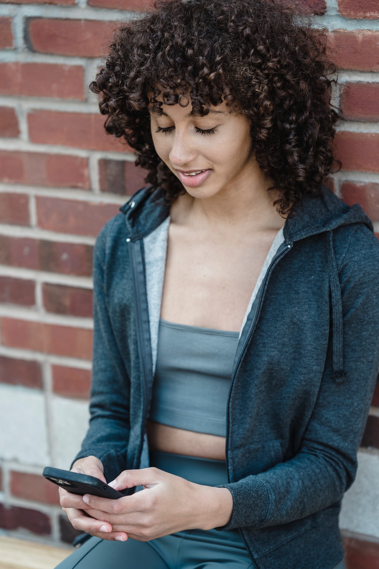 a girl playing with her smartphone